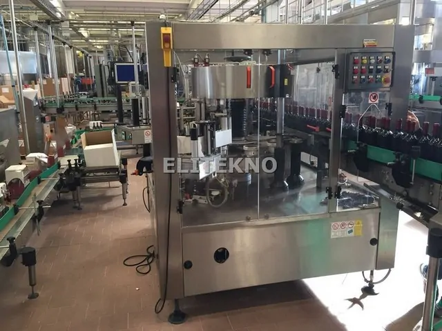 Étiqueteuse Newtec Adhésive 6.000 b/h d'occasion — 2004