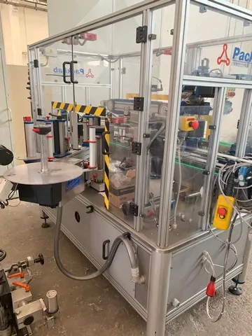 Étiqueteuse Packlab Adhésive 12.000 b/h MODULO 60 DX/SX 150 d'occasion — 2009