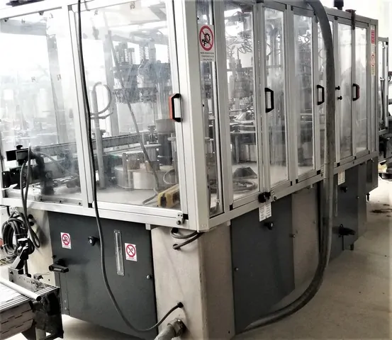 Capsuleuse Robino&Galandrino 12.000 b/h d'occasion — 1995